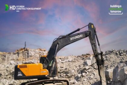 Hyundai R215L SMART Plus crawler mining excavator operating on rugged terrain, showcasing its powerful build, reinforced boom, and operator-friendly cabin.