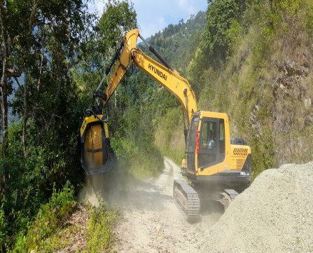 Civil contractor in Sikkim using MB Crusher jaw and screening buckets for road construction in remote Himalayan terrain