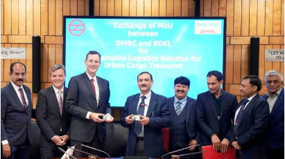 Delhi Metro Rail Corporation officials signing an MoU with Deendayal Port Authority, Umeandus Technology, and BEML Limited to develop a Real-Time Automated Cargo Evacuation System (e-FTS) at Kandla Port, Gujarat.