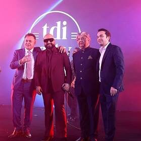 TDI Infrastructure celebrates 30 years with the grand unveiling of TDI City, Kundli, attended by Jacqueline Fernandez, B Praak, and the TDI Group leadership.