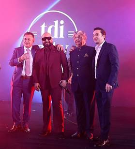 TDI Infrastructure celebrates 30 years with the grand unveiling of TDI City, Kundli, attended by Jacqueline Fernandez, B Praak, and the TDI Group leadership.