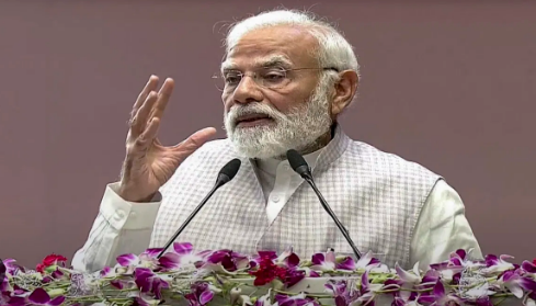 Prime Minister Narendra Modi releasing the 21st PM-KISAN instalment; income support scheme crosses ₹3.88 lakh crore disbursement.