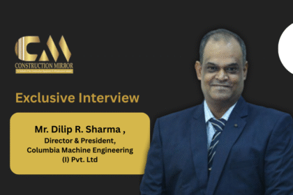 Portrait of Mr. Dilip R. Sharma, Director & President of Columbia Machine Engineering India, sharing insights on the future of concrete machinery, automation, and smart manufacturing.