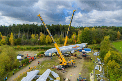 Liebherr mobile cranes lift 49 tonne Airbus A310 for restaurant project at Serengeti Park Germany