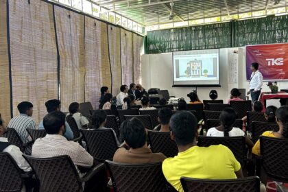 Volunteers mentoring children in classroom under community education programme