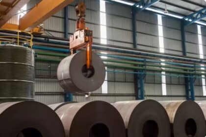 BlueScope Steel manufacturing facility with steel coils and industrial production line