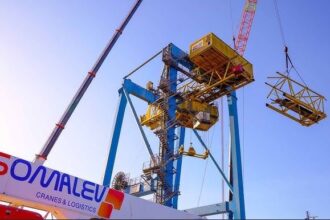 Somalev dismantling Liebherr STS cranes at Port of Casablanca using LTM 1400-7.1 all-terrain mobile crane.