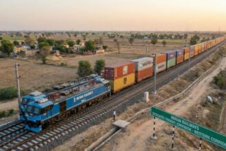 Freight train operated by Indian Railways transporting industrial commodities as freight loading rises to 137.72 million tonnes in February.