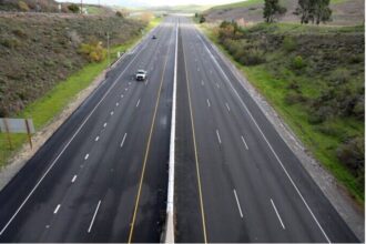 NH 48 Kamrej Chalthan highway expansion project near Surat to six lanes with service roads to reduce congestion