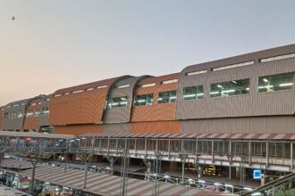 Parking and station infrastructure near Pune Metro corridor.