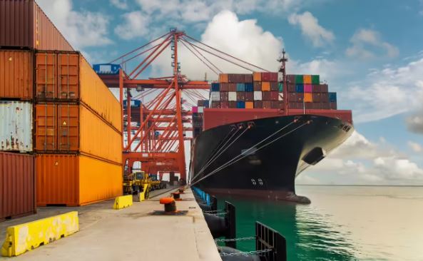 Cargo ships docked at Old Mangalore Port as Karnataka government seeks private operators for cargo berths under PPP model.