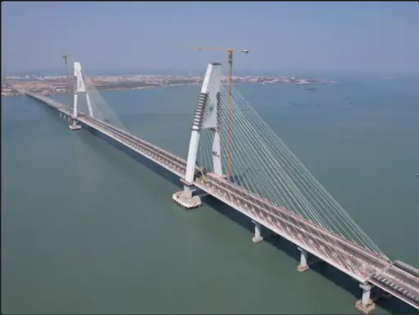 Signature Bridge spanning the Yamuna River in Delhi with its iconic cable-stayed pylon.