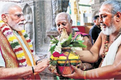 Prime Minister Narendra Modi addressing a public gathering in Madurai during an infrastructure project launch event.