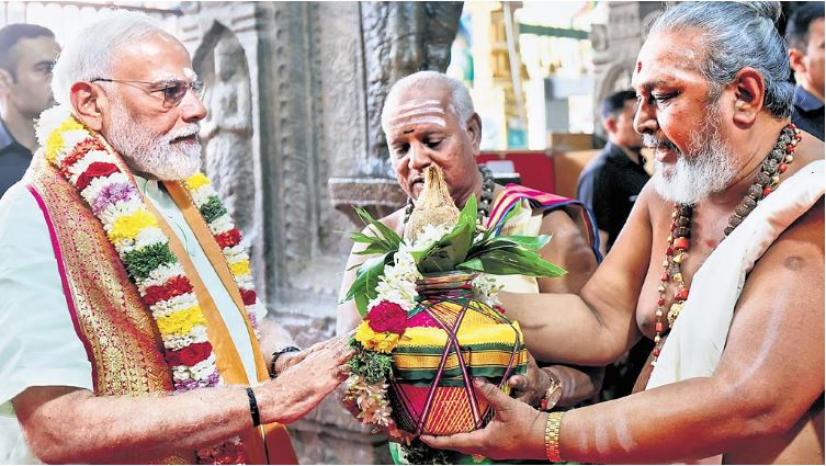 Prime Minister Narendra Modi addressing a public gathering in Madurai during an infrastructure project launch event.