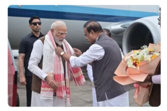 Prime Minister Narendra Modi launching ₹47,000 crore infrastructure projects in Assam including roads, railways, and energy initiatives to boost connectivity in Northeast India.