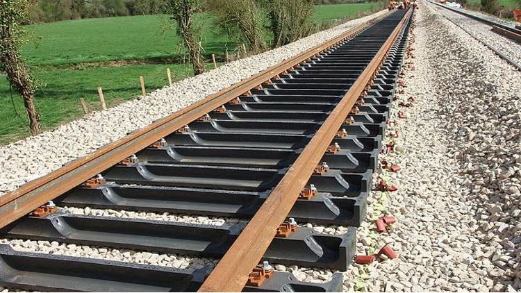 Indian Railways to adopt composite sleepers and AI-based track monitoring, enhancing safety, efficiency, and modern rail infrastructure across India.