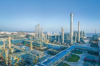 HPCL Rajasthan Refinery project under construction in Barmer with large industrial units and infrastructure