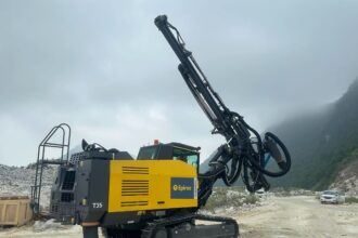 Epiroc smart drilling rig operating in quarry improving fuel efficiency reducing downtime with automated drilling technology