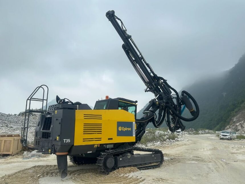 Epiroc smart drilling rig operating in quarry improving fuel efficiency reducing downtime with automated drilling technology